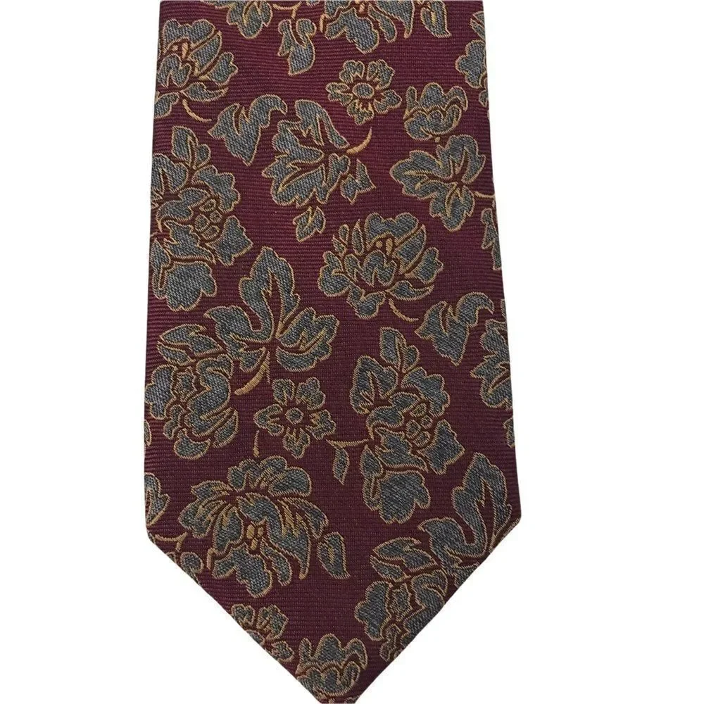 The Tie Bar deep red with‎ blue and gold floral design necktie.